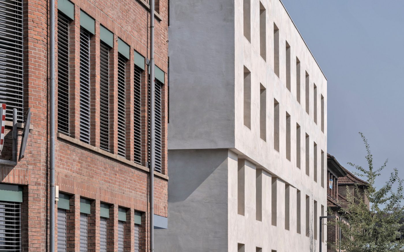 2226 Emmenweid. Brick Award 22 Category "Working together". Baumschlager Eberle Architekten. View from street