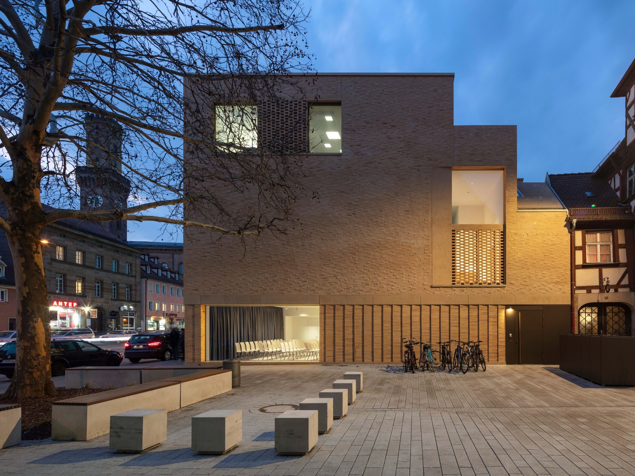 Jewish Museum Franken. Brick Award 22 Category "Sharing public spaces". Umarchitekt. outside view at dawn