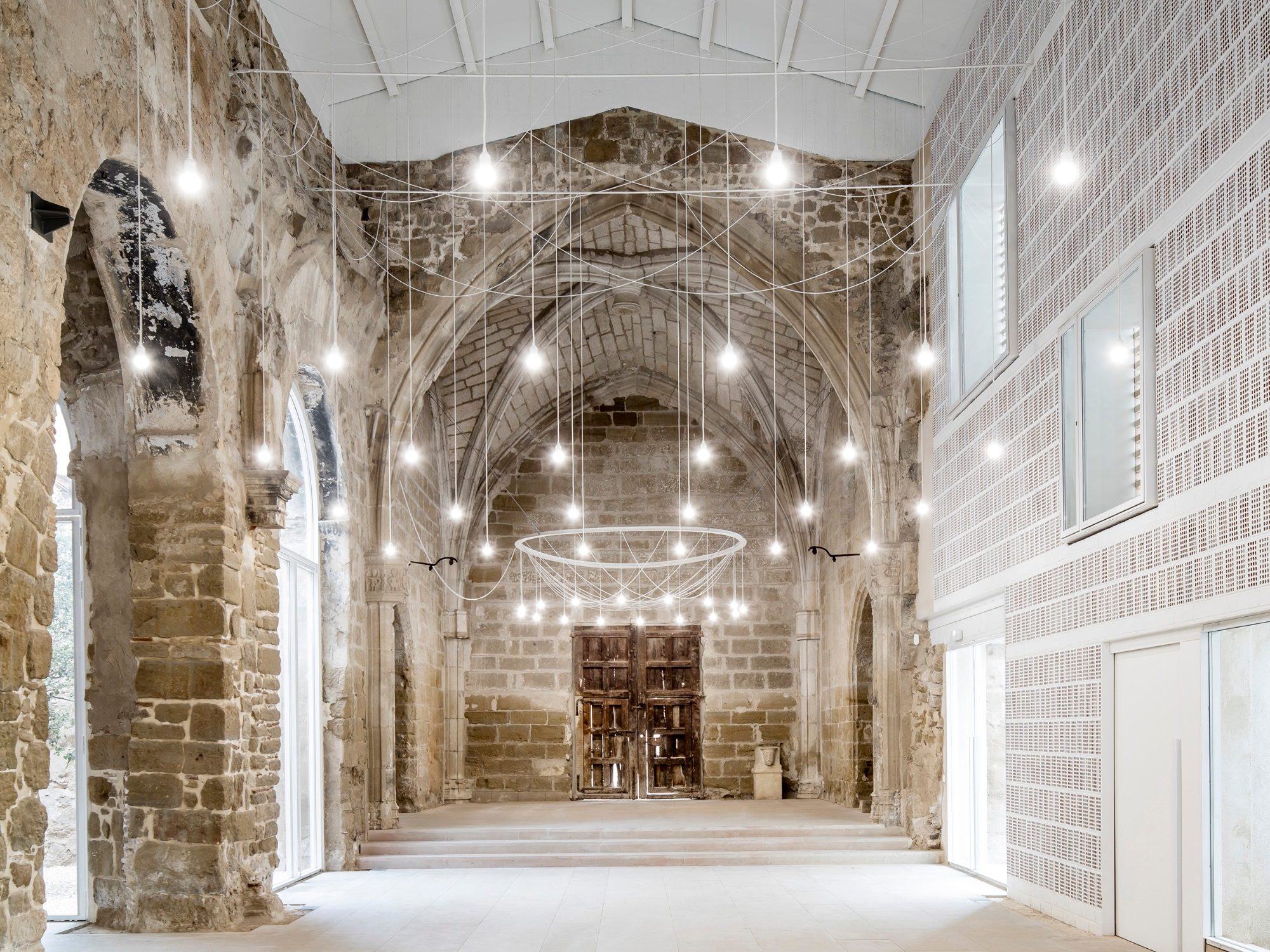 The Old Church of Vilanova de la Barca with facing bricks and roof tiles; Brick Award 2018 Special Prize Winner, Category "Building outside the Box"; Aleaolea Architecture & Landscape; Photo:  Adrià Goula