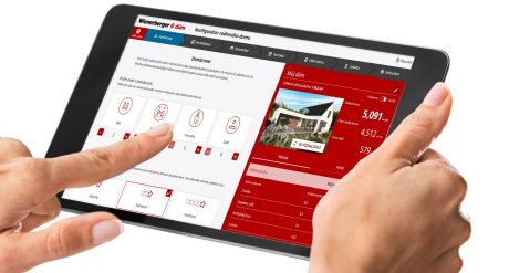 Ruka a tablet s konfigurátorem domu Wienerberger