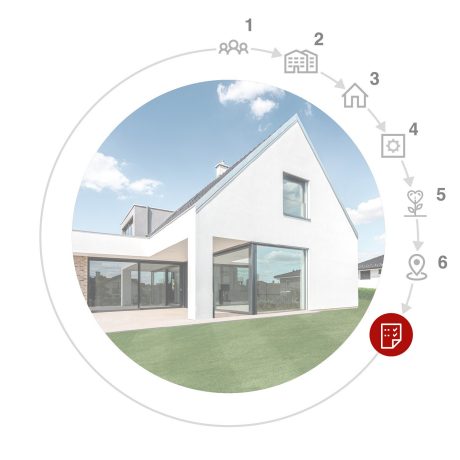 Ruka a tablet s konfigurátorem domu Wienerberger